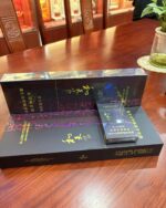 Baisha Heaven Slim cigarette packaging, black presentation box, carton, and pack arranged on a table