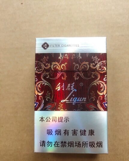 Liqun Xiuxian Gold Mid-Slim cigarette packaging, front of the silver and burgundy pack on a beige surface